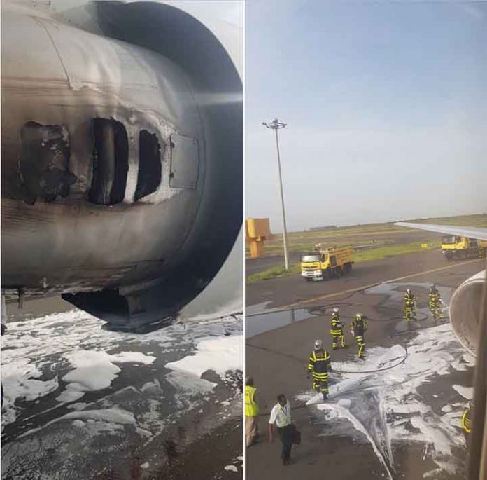 les pompiers éteingnant le feu de Ethiopian Airlines a l'aéroport de Dakar